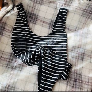 Black and white striped one piece